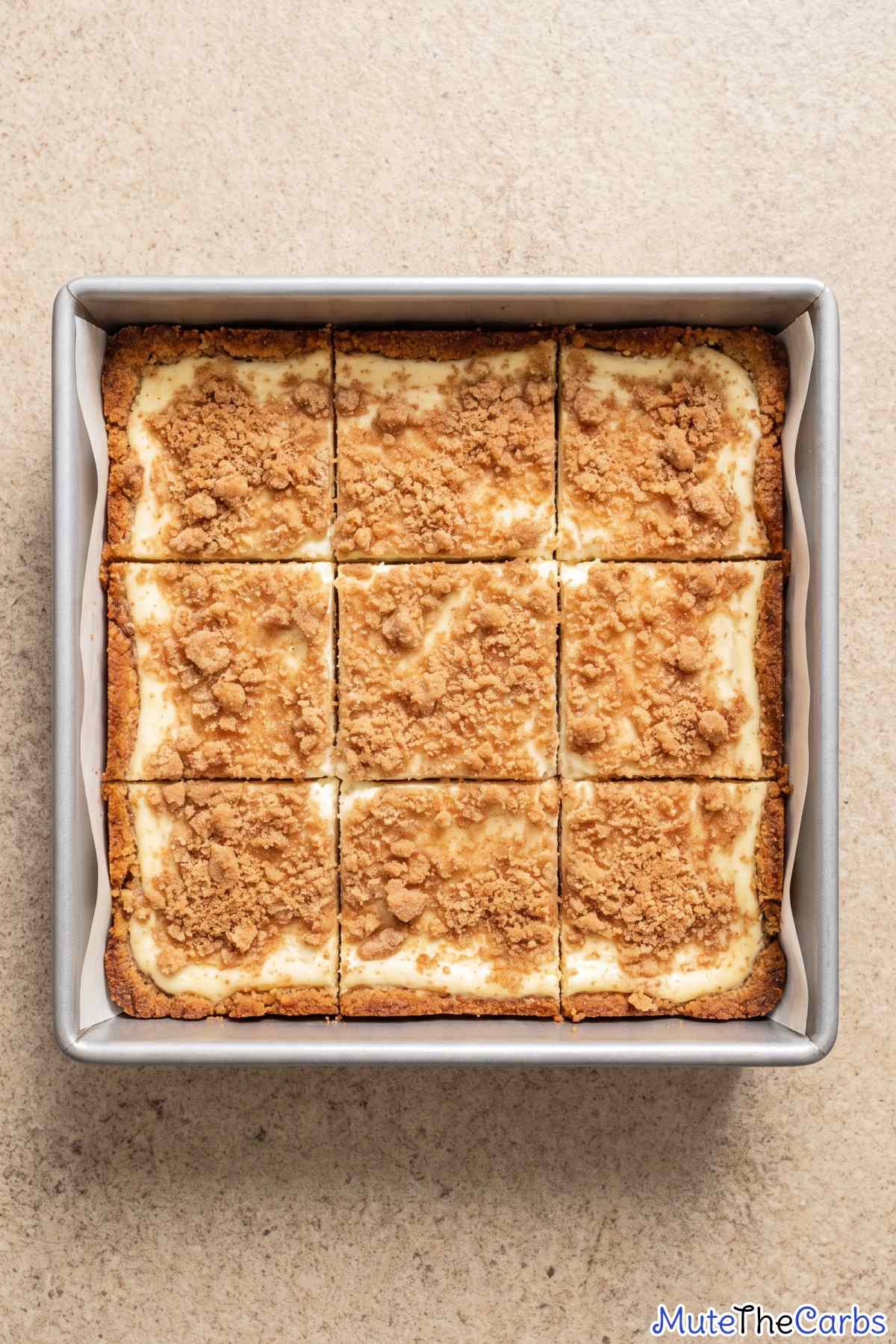 sliced keto cinnamon churro cheesecake bars