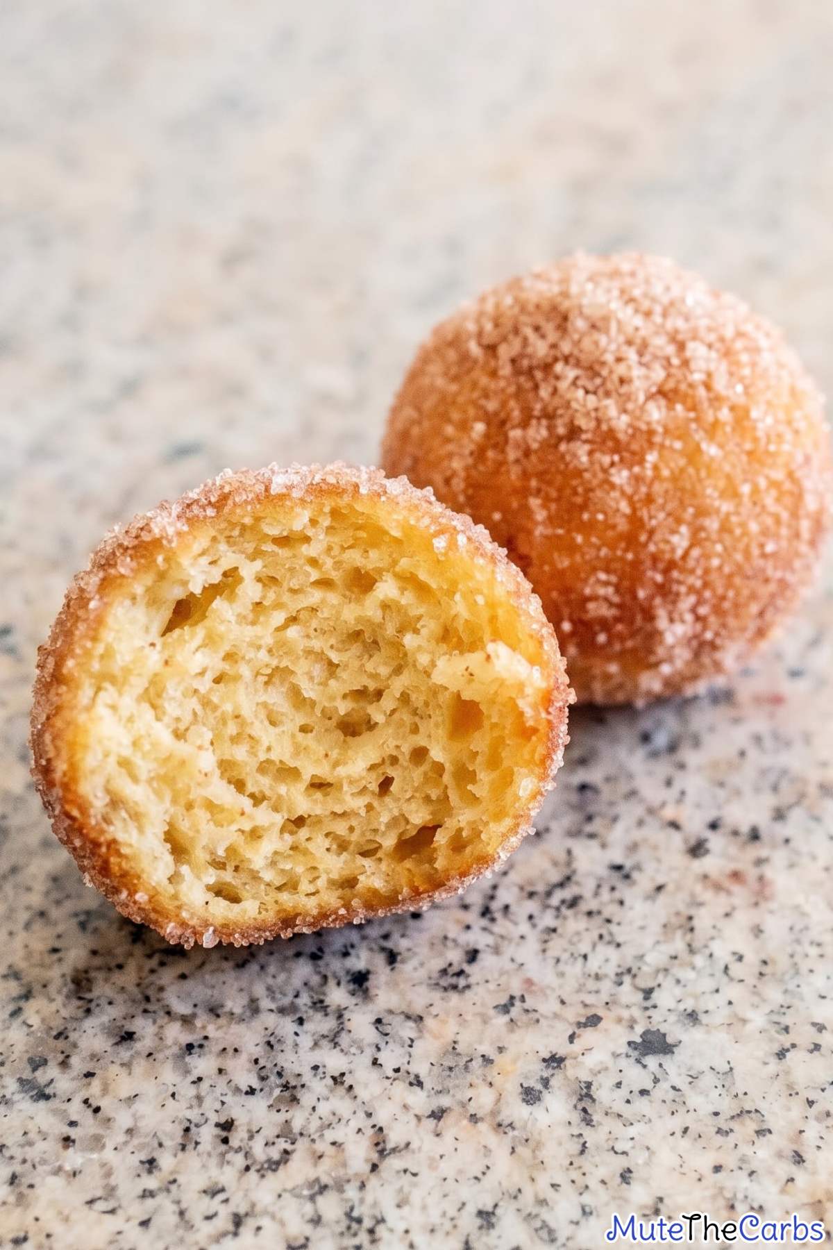Keto cinnamon sugar donut holes on a plate