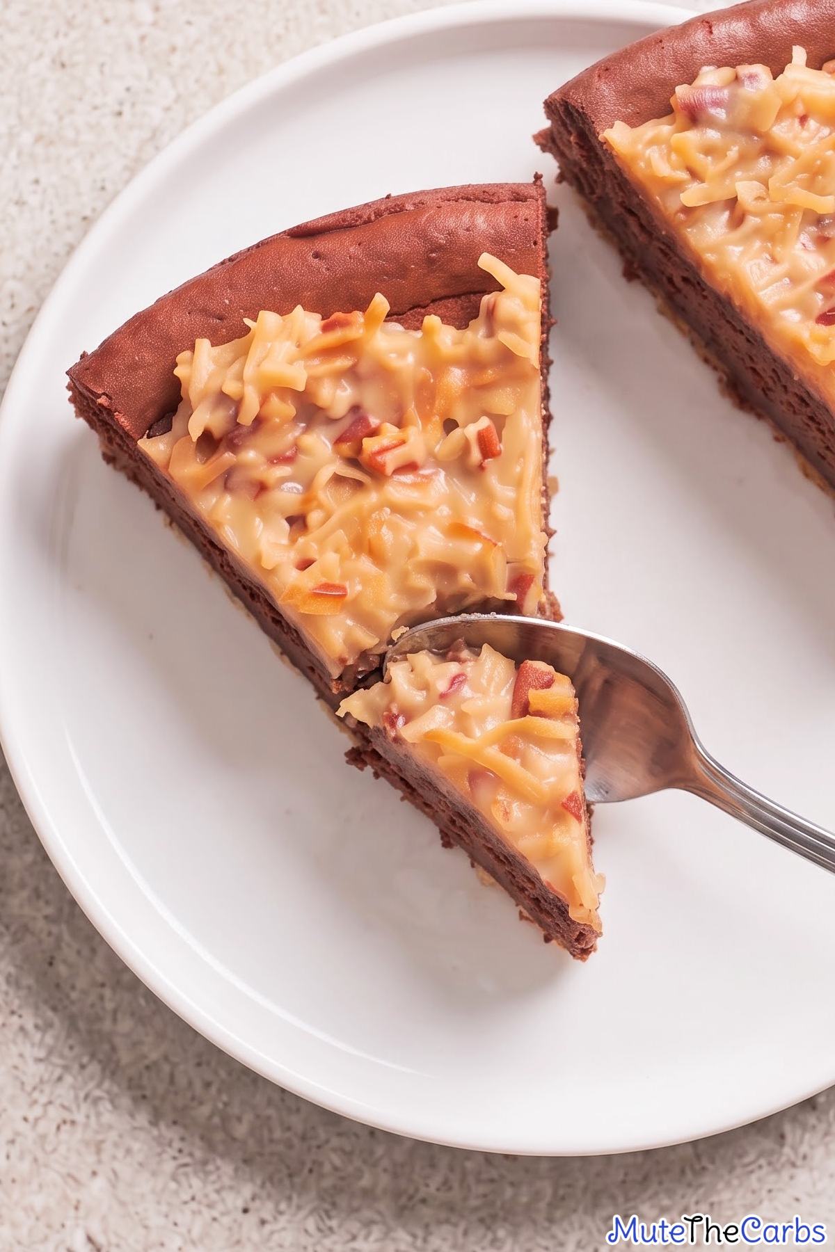 Keto cheesecake with coconut pecan topping