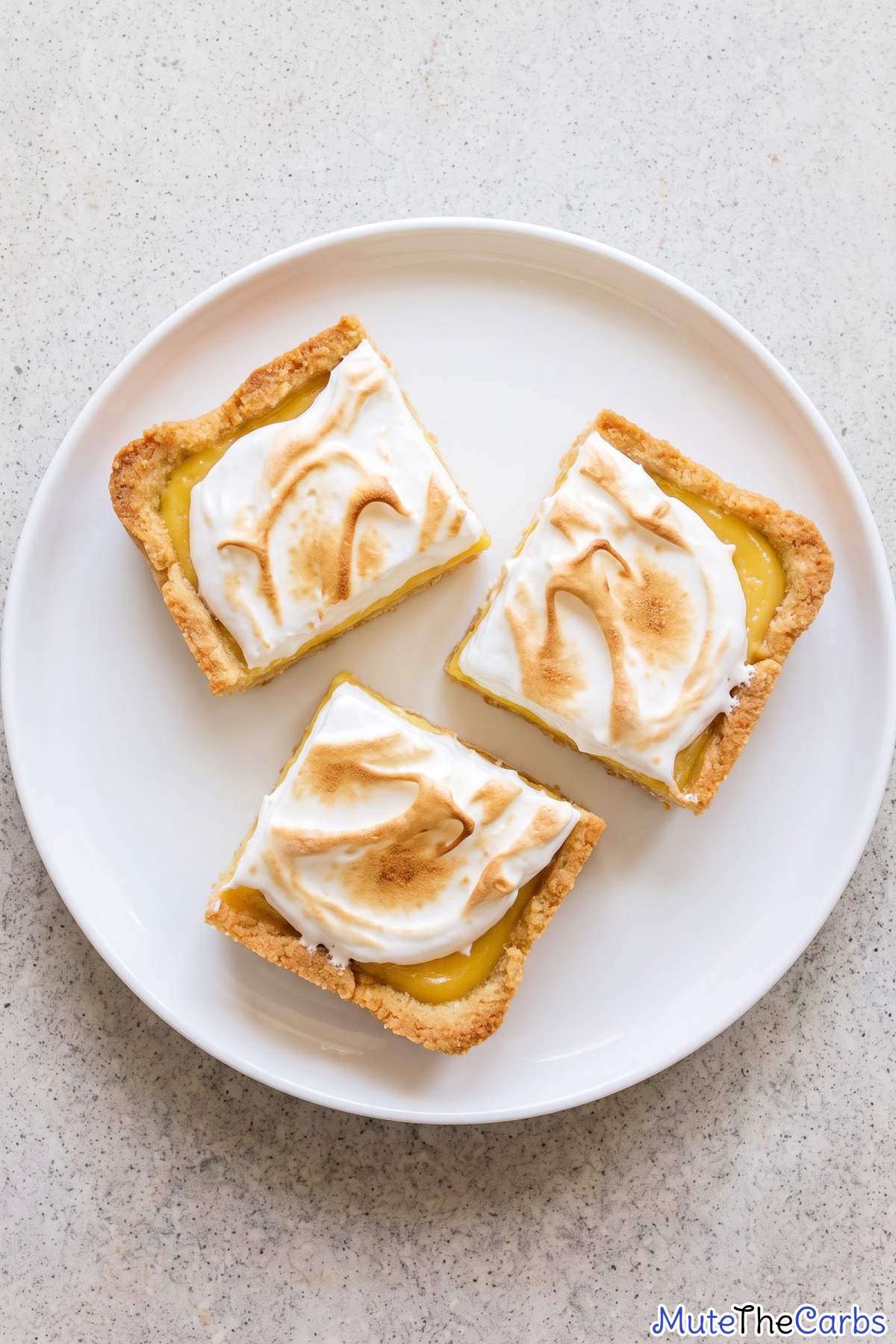 Keto lemon meringue bars on a plate