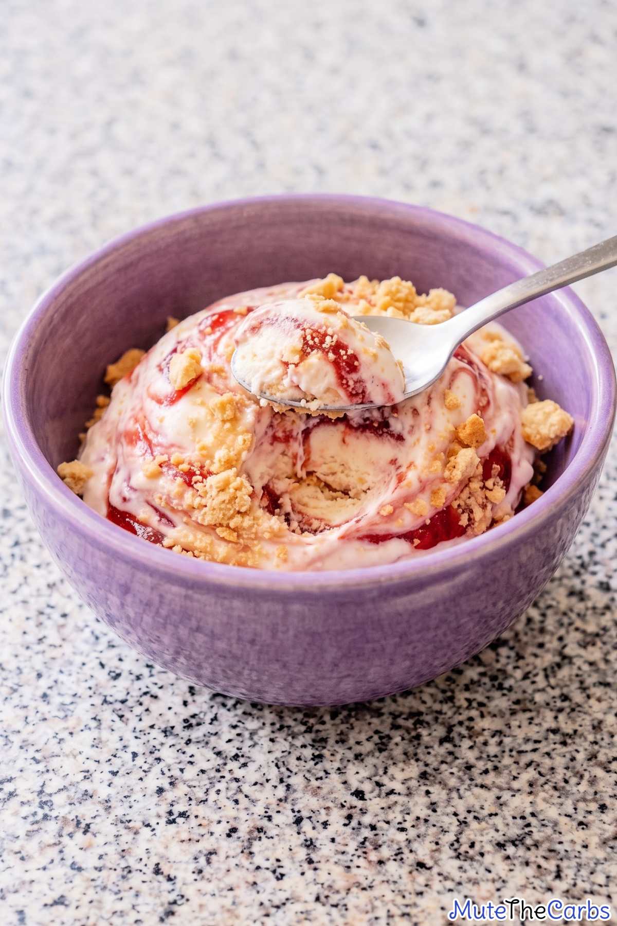 Scoop of keto strawberry shortcake ice cream